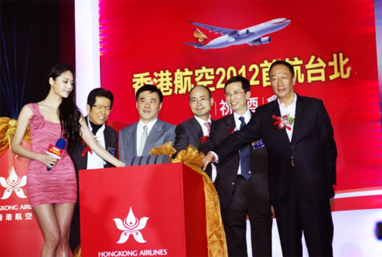 Mr John Leung (second right), a then Director of the Hong Kong-Taiwan Economic and Cultural Cooperation and Promotion Council, officiates with other guests at the ceremony organised by Hong Kong Airlines for the launching of new air routes in Taipei on March 1 2012. Mr Leung is also the then Director of the Hong Kong Economic, Trade and Cultural Office (Taiwan).