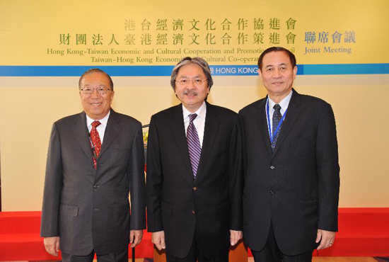Then Honorary Chairperson of the ECCPC, Mr John C Tsang (centre), then Chairperson, Mr Charles Lee (left), and then Chairperson of the Taiwan-HK Economic and Cultural Co-operation Council, Mr Liu Te-shun, join a group photo at the fourth joint meeting between the Councils on September 26 2013.
